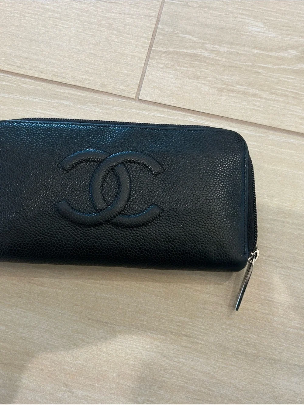 CHANEL Black Quilted Zip Around Wallet with Embossed CC
